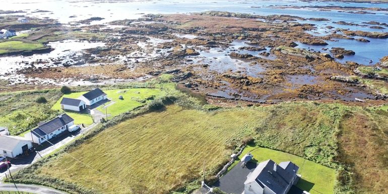 Gary O Donnell aerial of seaside site with houses