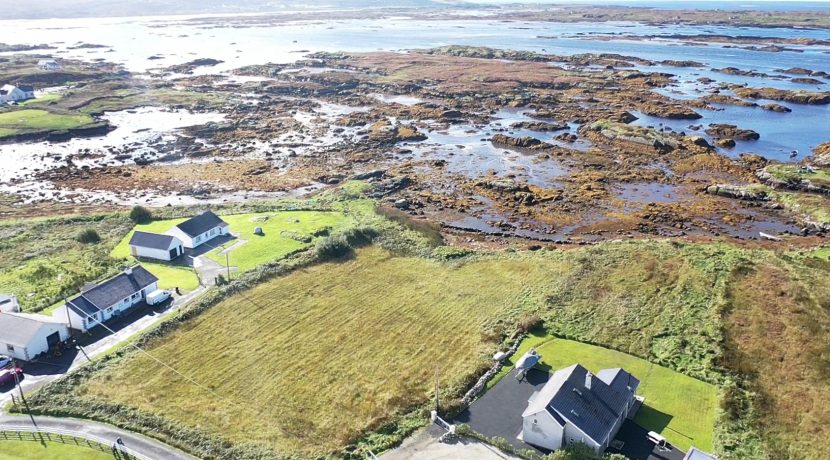 Gary O Donnell aerial of seaside site with houses