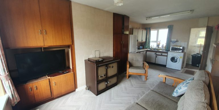 DMCD.6. LIVING AND KITCHEB AREA.