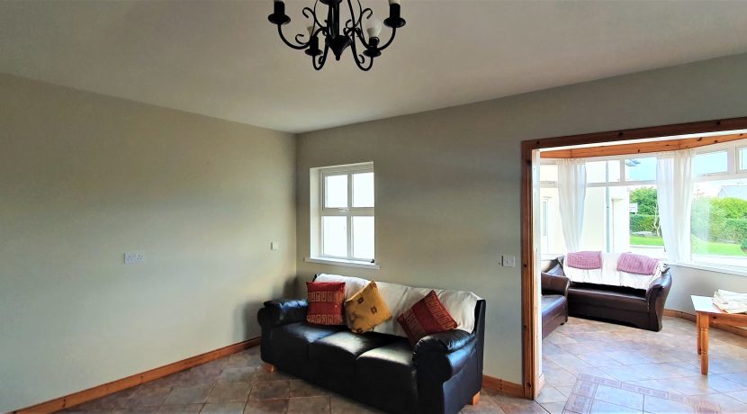 Marion Curran 49.view to sun room adj