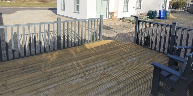 Logue 35. Lag decking area adj